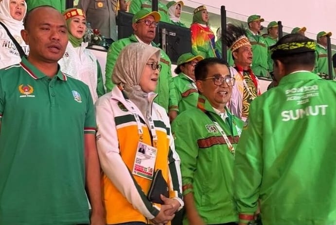 Pj Gubernur Kaltim Akmal Malik bersama Sekda Kaltim Sri Wahyuni, saat menghadiri acara penutupan PON Aceh-Sumut.(Ist)